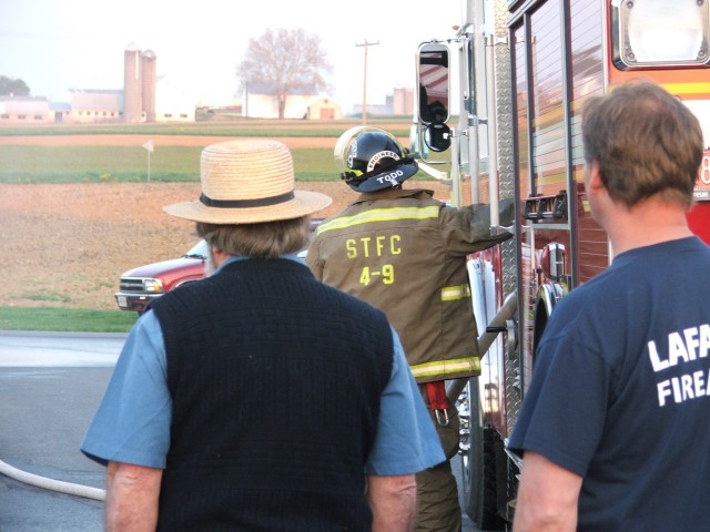 Chief Engineer Todd Steinmetz pumping Engine 4-9-1 at the Zone 4 Firemen's Competition in Bird-In-Hand... May 2005